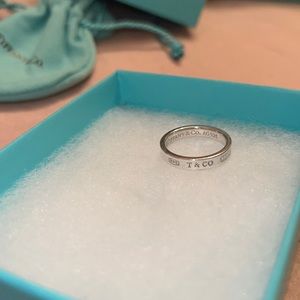 This is the Tiffany and Co 1837 ring.